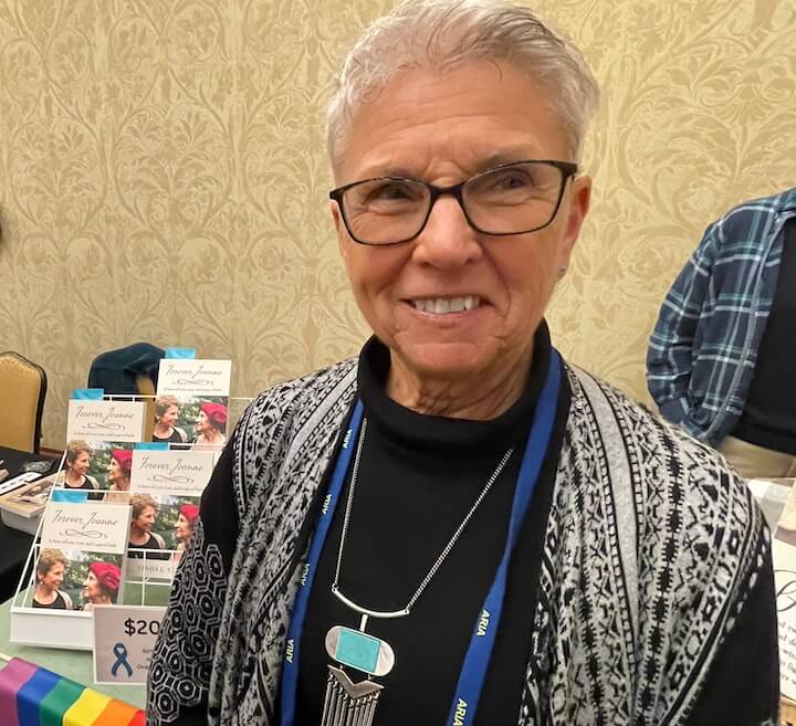 [CREDIT: Rob Borkowski] Linda Skibski, retired Orientation and Mobility Specialist for the blind and visually impaired, and author of Forever, Joanne: A Story of Love, Loss, and Leaps of Faith, at the RI Author Expo at Crowne Plaza Warwick Saturday. 