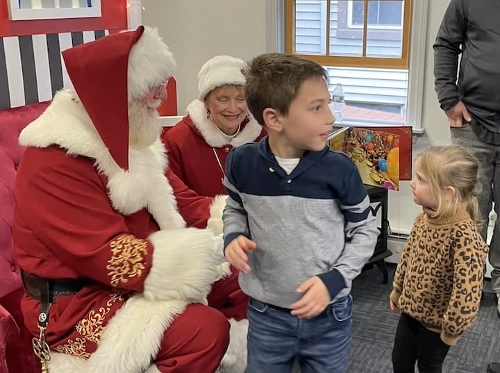 [CREDIT: Rob Borkowski] A happy James Haas exits his meeting with Santa during the Apponaug Winter Festival.