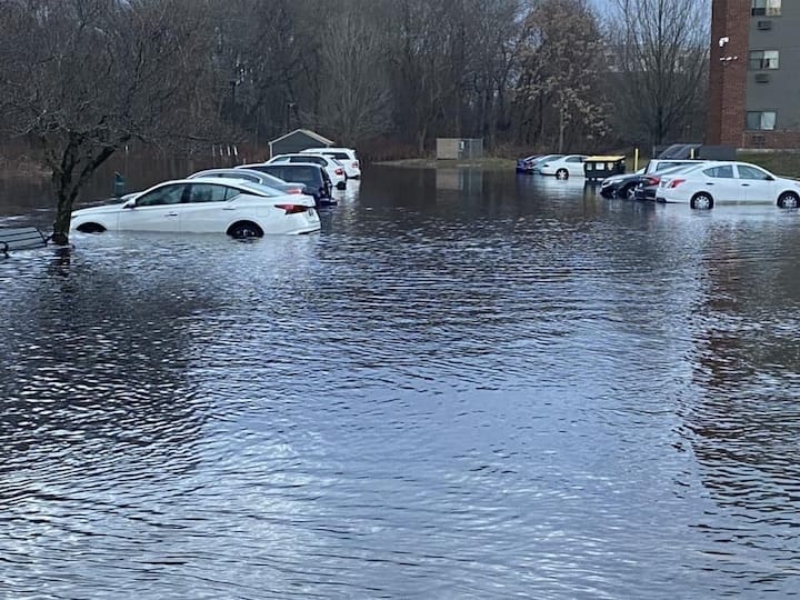 [CREDIT: Mayor Frank Picozzi] Flooding from the Dec. 18 2023 storm in the lot of Greenwich Village Apartments.