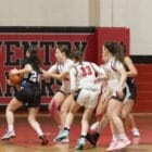 [CREDIT: Oaker Athletics/Facebook] Coventry's defense collapses around the Scituate offense on Dec. 11 in Coventry sports.