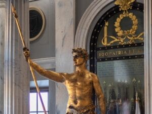 [CREDIT: Gov. Dan McKee's Office] The Independent Man statue will spend another few days in the State House main entrance before moving to Rhode Island National Guard’s North Main Street Armory in Providence.