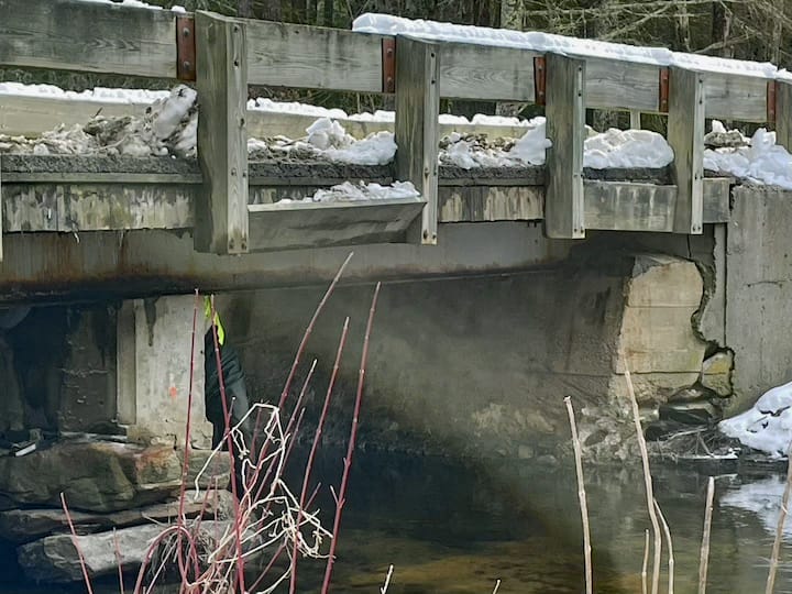 [CREDIT: Rob Borkowski] Cahoone Road Bridge, closed to traffic due to erosion from heavy rains in January. The bridge is scheduled for repair in 2026. The bridge supports appear to be leaning to the side.