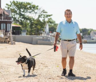 [CREDIT: Speaker Shekarchi's Office] RI Speaaker Joe Shekarchi (D-Dist. 23) walking in Warwick with his rescue dog, Merlin.