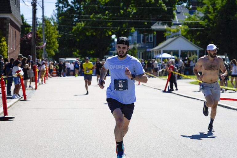 [CREDIT: Laura Paton] Douglas Jensen of Coventry during the Gaspee Days 5K June 8 with a time o 20:39.