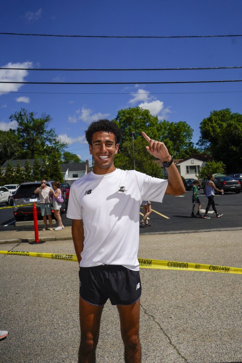 [CREDIT: Laura Paton] First place male runner, Abdel Laadjel, 20, of Providence, with a time of 14:20, shortly after finishing the Gaspee Days 5K Saturday, June 8.