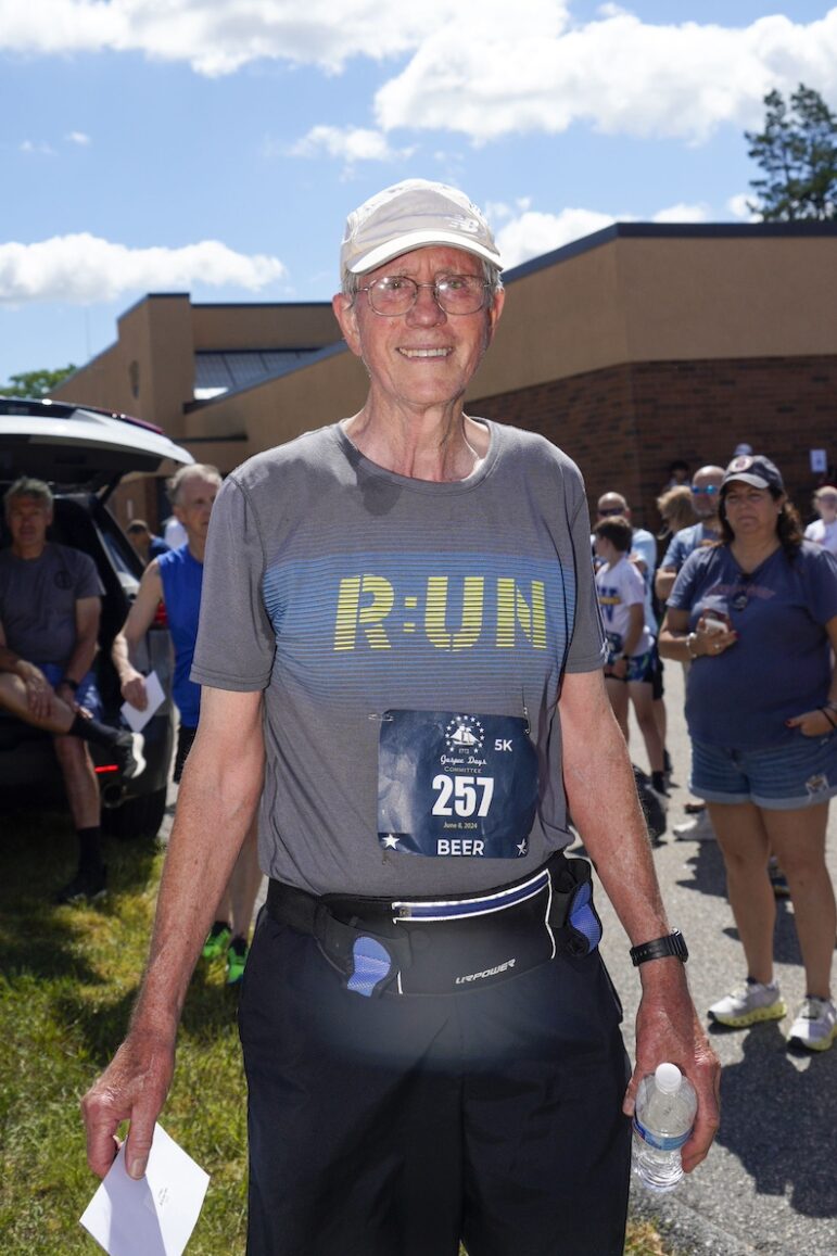 [CREDIT: Laura Paton] Bob Bixby, 80, of Greenville, places first in the male over 80 division, with a time of 37:15.