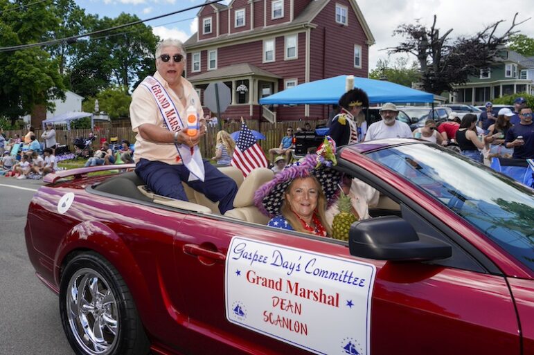 [CREDIT: Laura Paton] Gaspee Days Parade Grand Marshal Dean Scanlon, readies his water gun during the 2024 Gaspee Days Parade June 8.