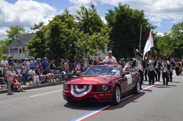 [CREDIT: Laura Paton] Gaspee Days Parade Grand Marshal Dean Scanlon, owner of Revolution American Bistro in Cranston, rode just ahead of the Kentish Guards during the 2024 Gaspee Days Parade June 8.