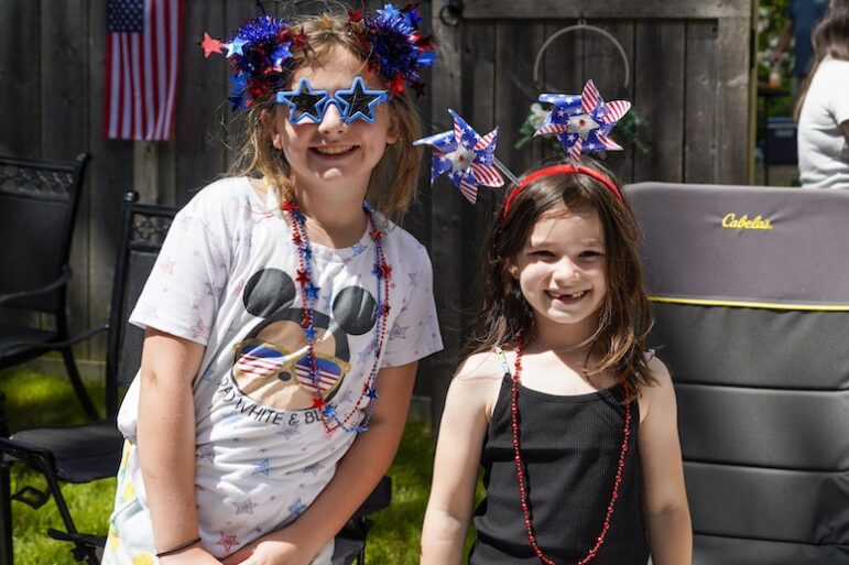 [CREDIT: Laura Paton] Emma Frederick and Talia Toolin of Warwick, don their best patriotic garb for the 2024 Gaspee Days Parade June 8.