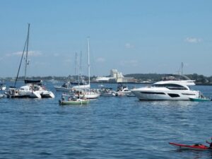 [CREDIT: DEM] Boats and paddle craft in the water outside Fort Adams State Park in Newport during the 2023 Folk Festival. DEM reminds people enjoying their time on the water to keep safe boating tips in mind.