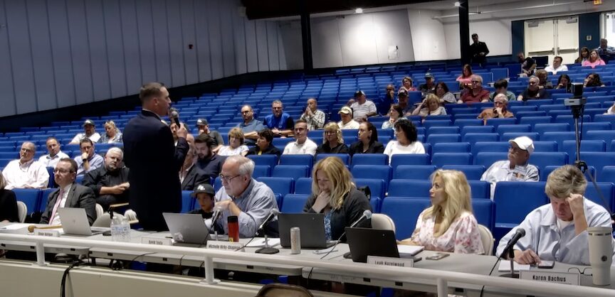 [CREDIT: WPS] Warwick School Committee Chairman Shaun Galligan addresses the audience, outlining the details of the new high schools project staring March 2025.