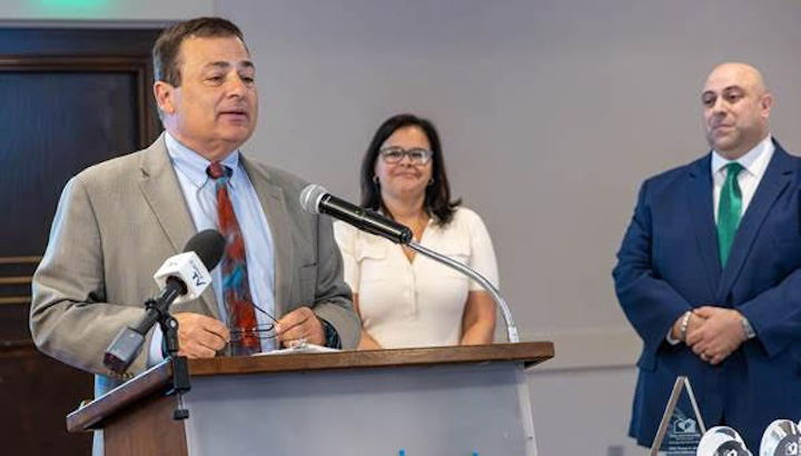 [Legislative Press & Public Information Bureau] Speaker of the House K. Joseph Shekarchi addresses the Rhode Island Partnership for Home Care after receiving the association’s Thomas A. Lamb Home Care Advocacy Award recently. In back are partnership President Cheryl Levesque and Executive Director Nicholas Oliver.