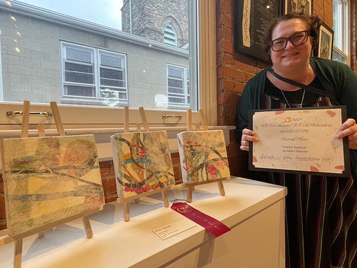 [CREDIT: Rob Borkowwski] Mary Geisser, second Place winner in the in WCFA's annual Art Educators Exhibit, with her piece, "Tracks Tryptych."