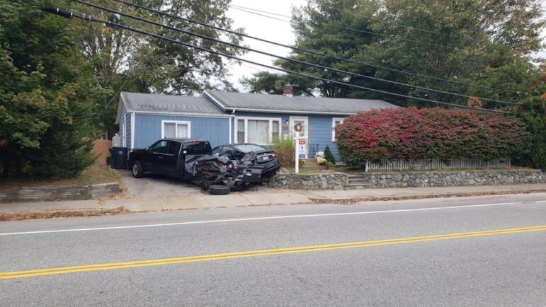 [CREDIT: Mary Carlos] Police have charged the driver in an 109 Hopkins Hill Road DUI crash Oct. 12 into two parked vehicles.