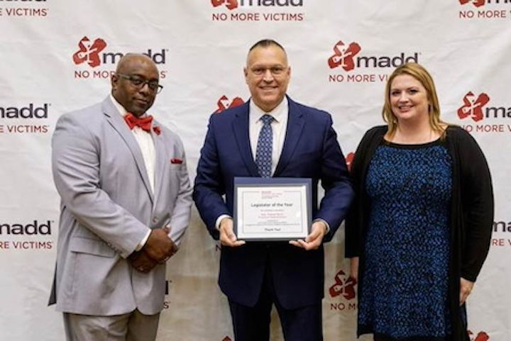 [CREDIT: LPPIB] Rep. Thomas Noret, center, is presented with the MADD Legislator of the Year award Friday morning by Program Director Wesley Pennington, left, and Program Manager Jennifer O’Neil at the Crowne Plaza Hotel in Warwick.