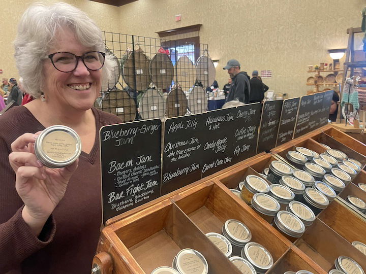 [CREDIT: Rob Borkowski] Vicki Esty, owner of Made By Vicki Jams and Jellies, at the Shop RI expo during Small Business Saturday.