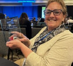 [CREDIT: RIDDC] Sue Babin, holding her Dave Hammis Employment Innovation Award, presented during the (APSE) Conference, held this June in South Carolina.