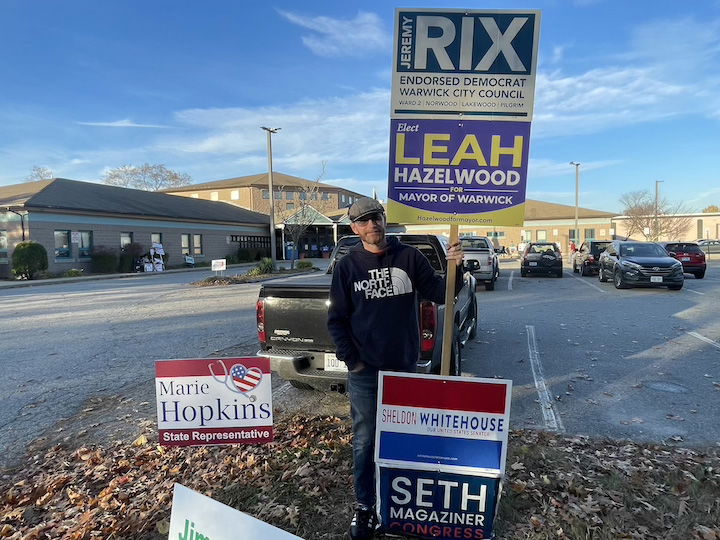 [CREDIT: Rob Borkowski] Andrew Ober, holding a sign for Ward 2 City Councilman Jeremy Rix outside the Pilgrim Senior Center, reported steady traffic. Nov. 5 during the Warwick 2024 election turnout.