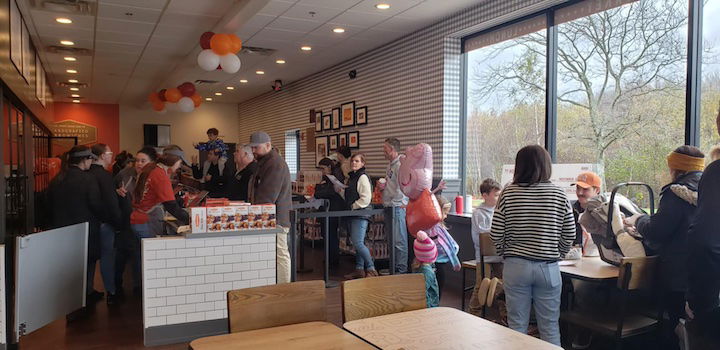 [CREDIT: Mary Carlos] Customers sampled food and competed for prizes as the first Warwick Honey Baked Ham store opened at 300 Quaker Lane Nov. 23.