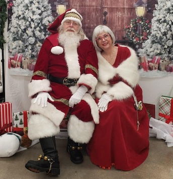 [CREDIT: Mary Carlos] The new Warwick Ocean State Job Lot Grand Opening Nov. 23 had lots to offer curious shoppers, including photos with Mr. and Mrs. Claus. 