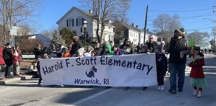 [CREDIT: Rob Borkowski] Scott Elementary kids and staff in the parade during the Rolling, Strolling Apponaug Winter Festival Dec. 7, 2024.