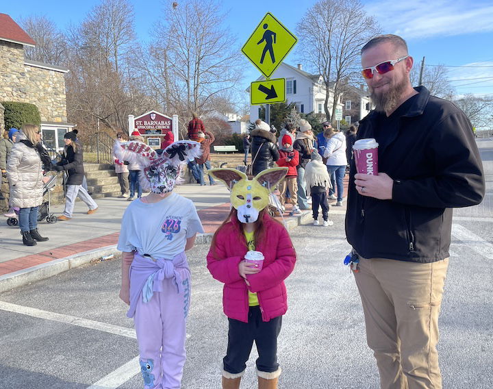  [CREDIT: Rob Borkowski] Joe Fish and daughters Layla, 12 and Joleah, 8, with mom, Alexis, not picurted, during the Rolling, Strolling Apponaug Winter Festival Dec. 7, 2024.