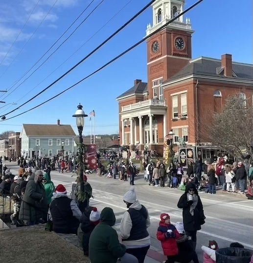 [CREDIT: Rob Borkowski] Eager crowds lined Post Road waiting for the parade during the Rolling, Strolling Apponaug Winter Festival Dec. 7, 2024.