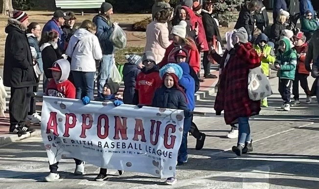 [CREDIT: Rob Borkowski] Apponaug Babe Ruth Baseball in the parade during the Rolling, Strolling Apponaug Winter Festival Dec. 7, 2024.