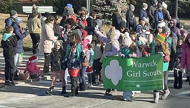 [CREDIT: Rob Borkowski] Warwick Girl Scout Troop 18 in the parade during the Rolling, Strolling Apponaug Winter Festival Dec. 7, 2024.