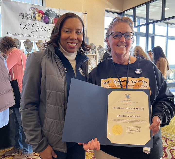 [CREDIT: RIDDC] Sue Babin, RIDDC Special Projects Coordinator and chair of Shop RI, received a proclamation from Lt. Gov. Sabina Matos recognizing Small Business Saturday Shop RI for its support of the business community. 