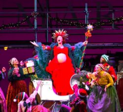 [CREDIT: Mark Turek] Anne Scurria as Ebenezer Scrooge, Alex LeBlanc as company, Hannah Spacone as the Ghost of Christmas Past, and Tobias Wilson as company, during Trinity's production of 'A Christmas Carol' at PPAC.