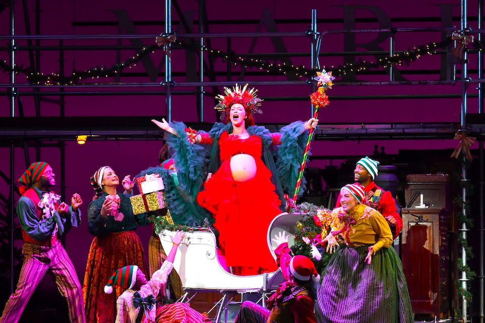 [CREDIT: Mark Turek] Anne Scurria as Ebenezer Scrooge, Alex LeBlanc as company, Hannah Spacone as the Ghost of Christmas Past, and Tobias Wilson as company, during Trinity's production of 'A Christmas Carol' at PPAC.