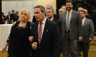  [CREDIT: Rob Borkowski] City officials enter main ball room at Crowne Plaza for the Warwick Inauguration Jan. 7, 2025. From left, front, Kim Picozzi, her husband, Mayor Frank Picozzi, Warwick City Council President Anthony Sinapi, City Councilman Jeremy Rix, majority leader, followed by council members Willam Foley (Ward 1), Vincent Gebhart (Ward 9) Bryan Nappa (Ward 3), Sal DeLuise (Ward 4) Edgar Ladouceur (Ward 5) William Muto (Ward 6) and John Kirby (Ward 7).