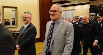 [CREDIT: Rob Borkowski] Warwick School Committee members proceed into the Crowne Plaza ballroom for the Warwick inauguration Jan. 7, 2025. From left, newly elected Warwick School Committee Member Sean Wiggins and re-elected Warwick School Committee member David Testa.